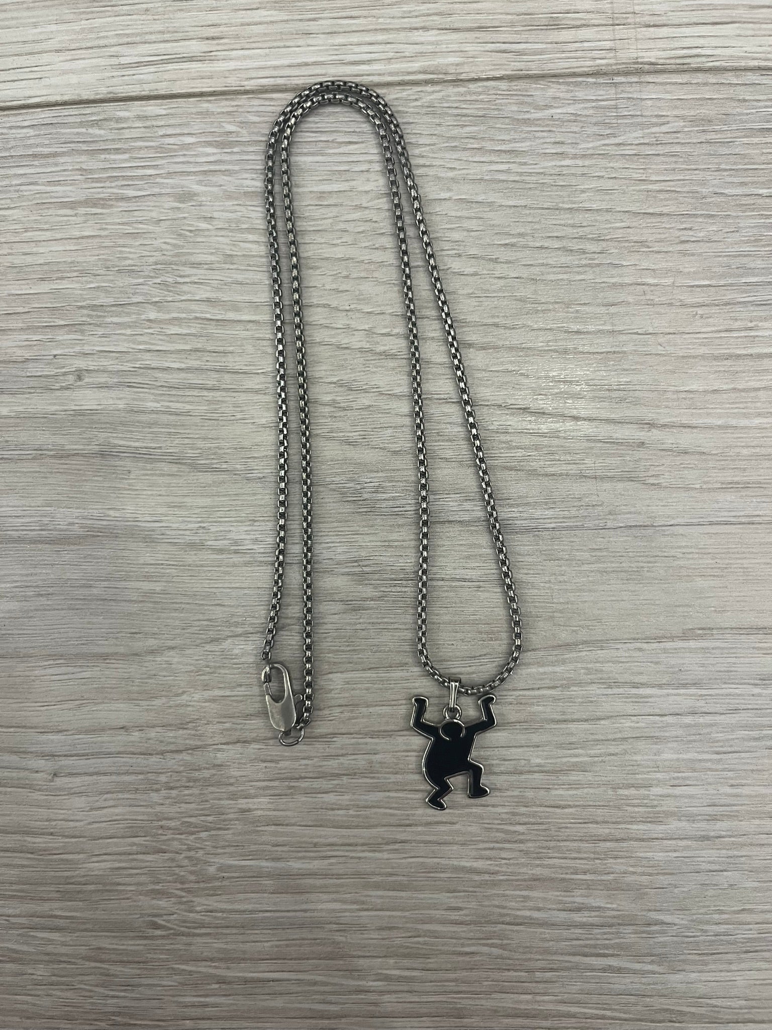 h&m keith haring necklace