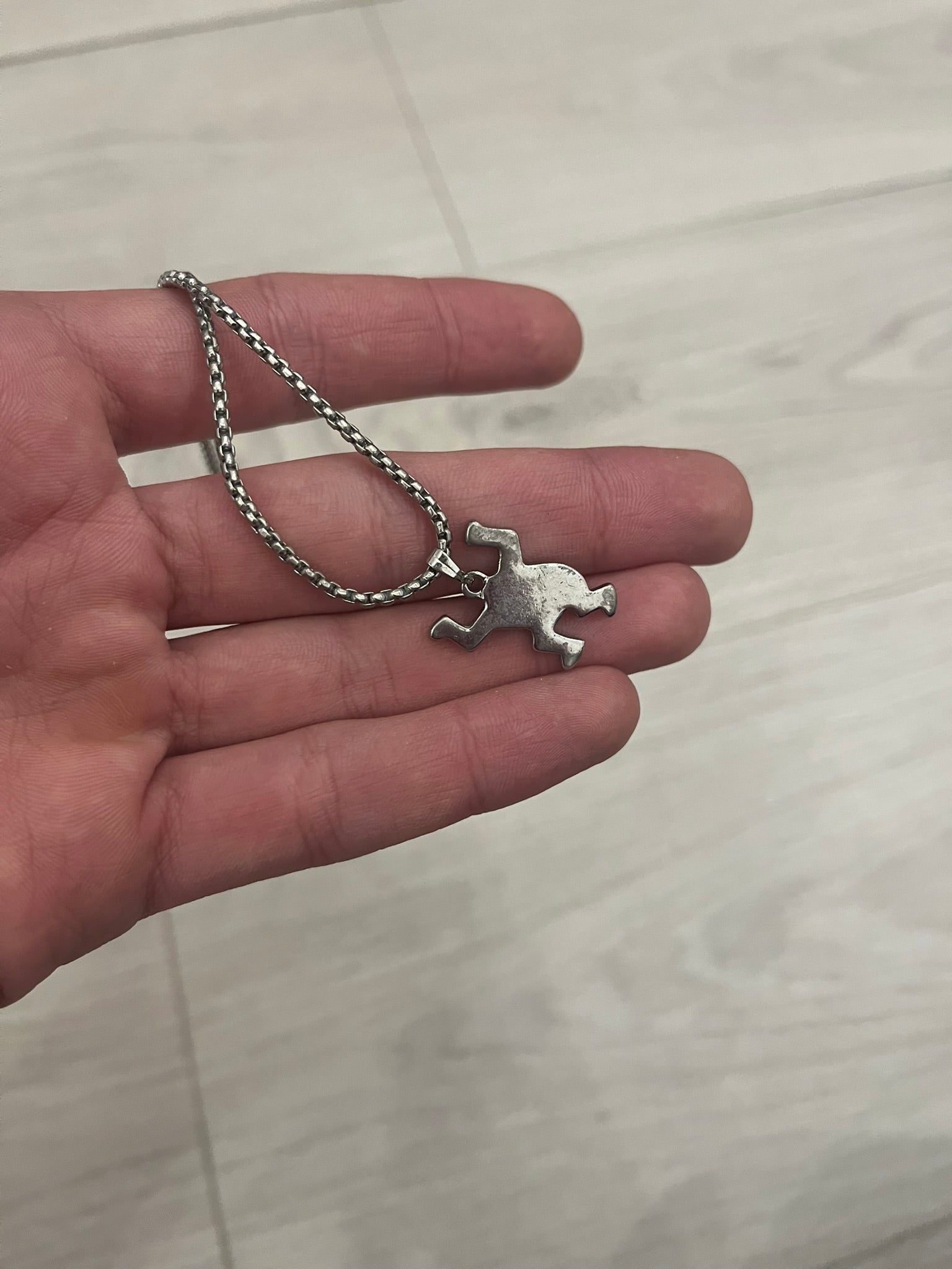 h&m keith haring necklace