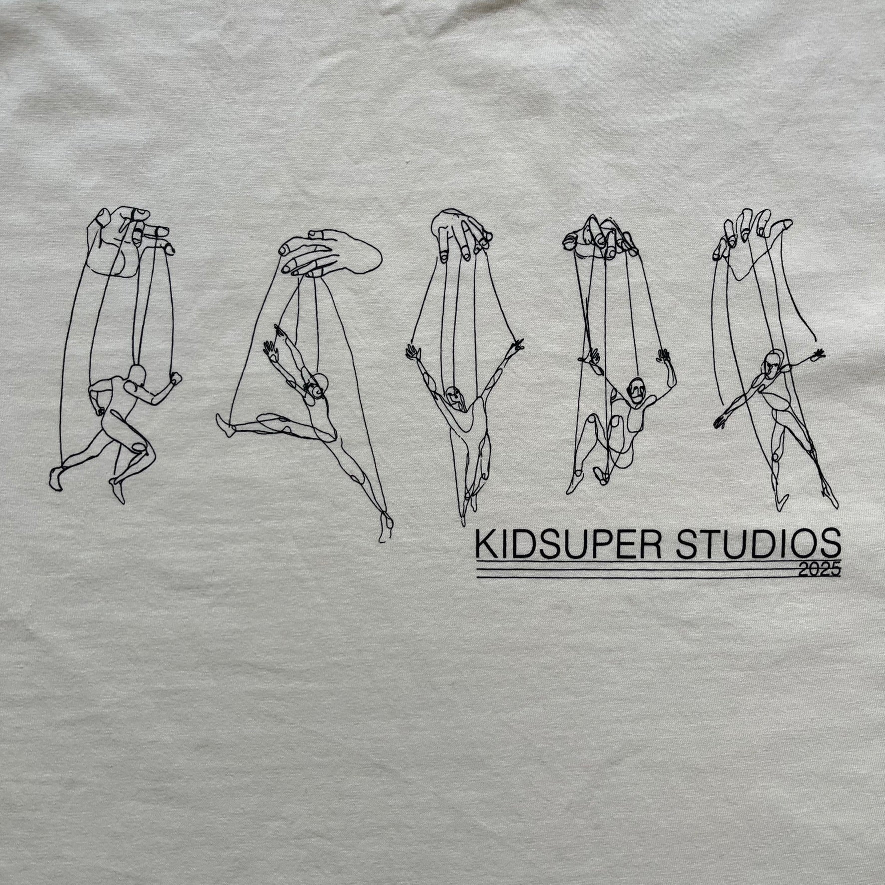 KidSuper Studios SS25 "String Puppets'" Cream Tee