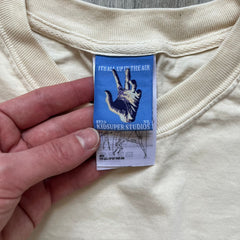 KidSuper Studios SS25 "String Puppets'" Cream Tee