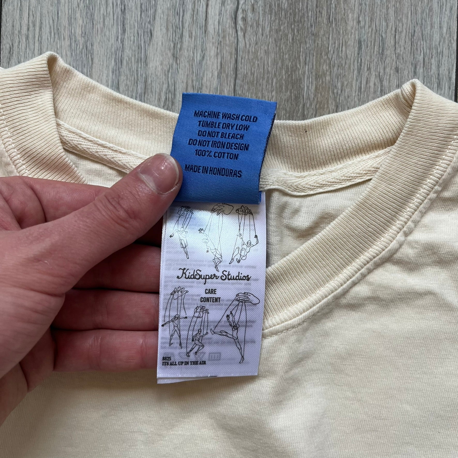 KidSuper Studios SS25 "String Puppets'" Cream Tee